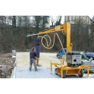 Machine pose dalles par aspiration